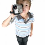 A boy recording videos 